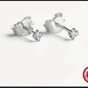 See Photos.  Small Stud Earrings 925 Silver Hypoallergenic with Cubic Zircon